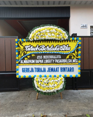 Papan Bunga Duka di Karya Mulia